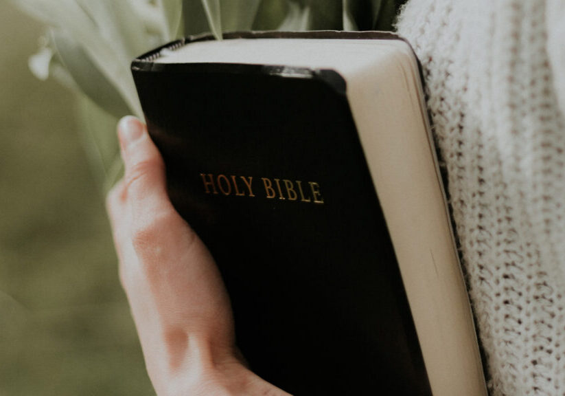 woman-holding-Holy-Bible